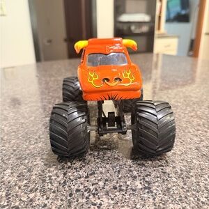 Fiery Orange Monster Truck Toy